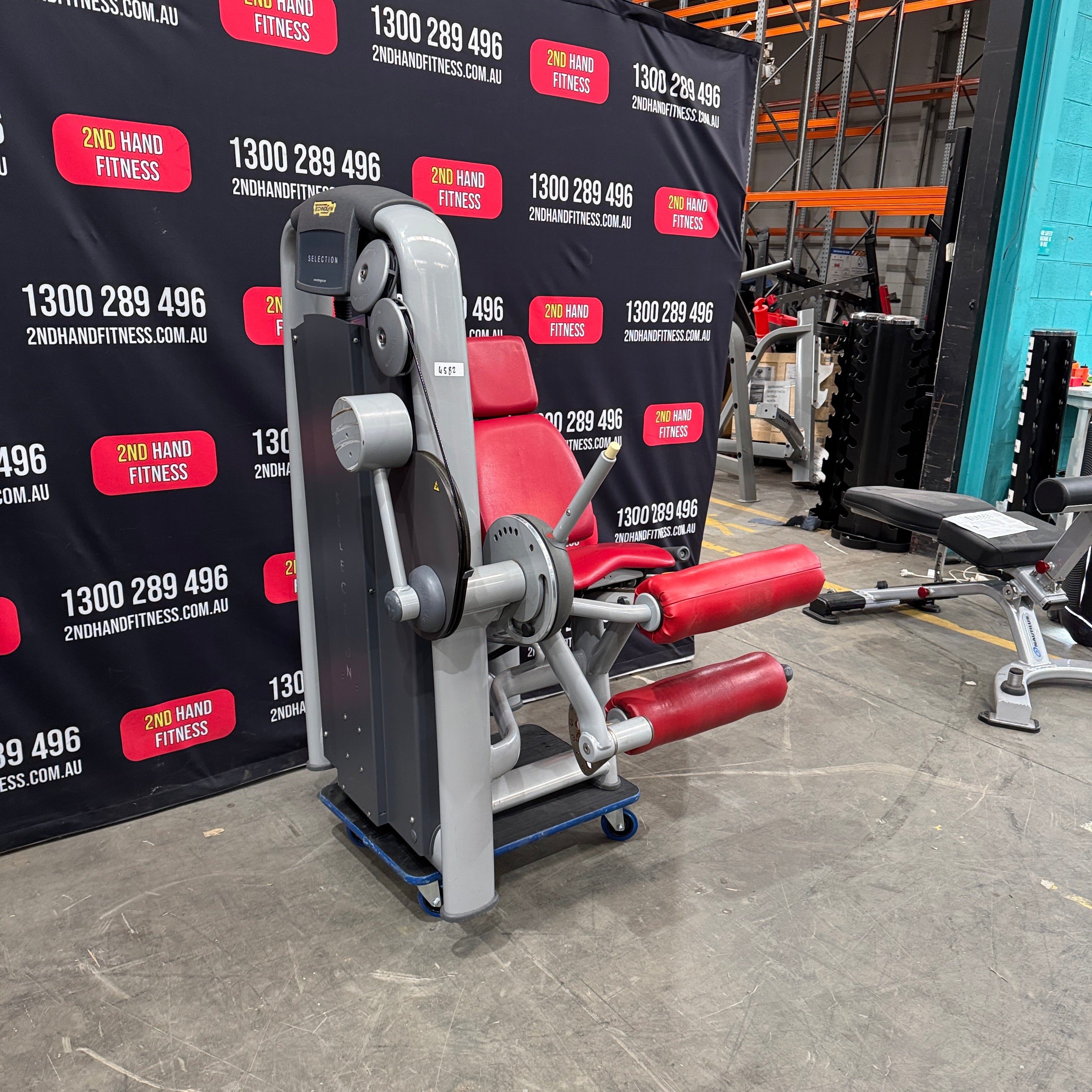 Technogym Selection Leg Curl - Silver Frame, Red Upholstery